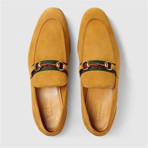 gucci brown suede horsebit loafers.